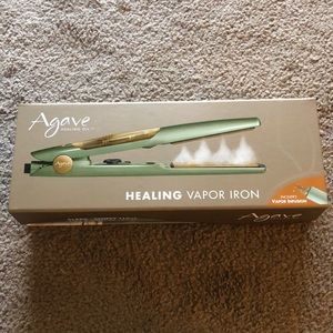 Vapor hair iron. Hair straightener. Healing hair